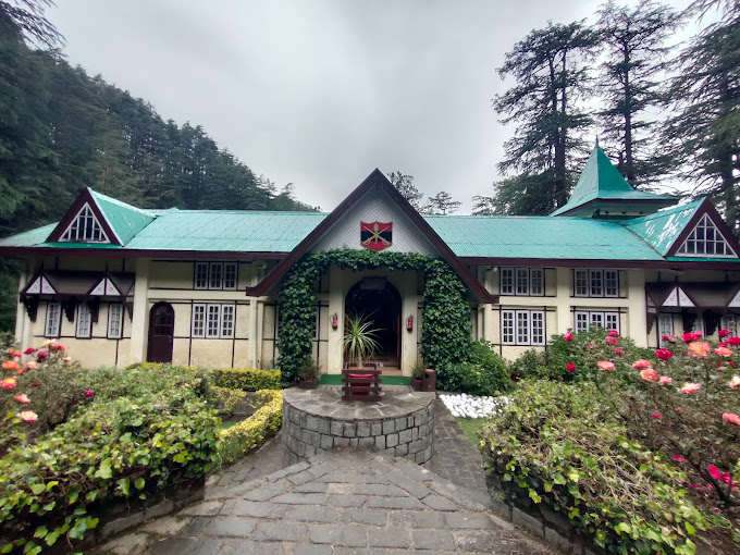 Things to do in Shimla: Exploring the serene beauty of Mall Road on a leisurely evening stroll with the Himalayan mountains as your backdrop.