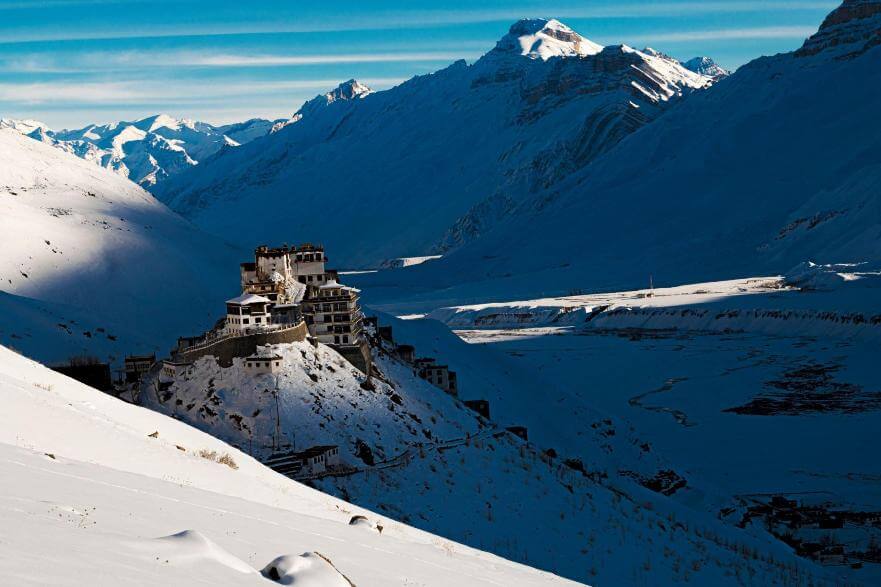 Snow blankets the serene landscape of Spiti Valley.
