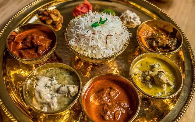 Top things to do in Srinagar is Indulge in Kashmiri Cuisine